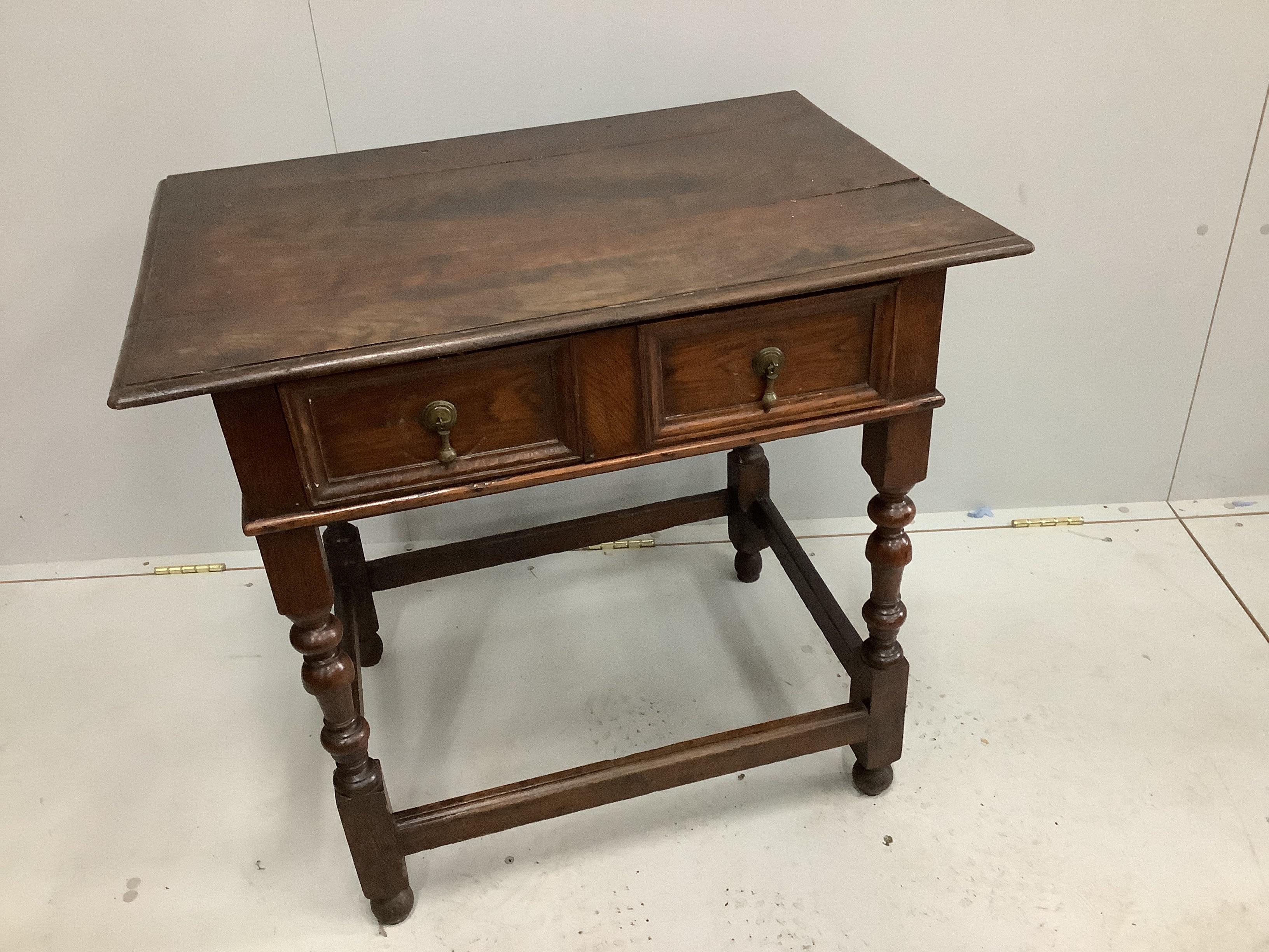 An 18th century oak side table, width 76cm, depth 51cm, height 70cm